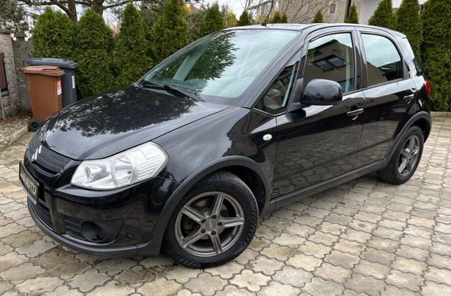Suzuki SX4 cena 19900 przebieg: 143000, rok produkcji 2008 z Wisła małe 497